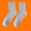 Calcetines de comercio exterior para hombre, calcetines hasta la pantorrilla, calcetines deportivos blancos y negros, medias de color liso, calcetines Zhuji para pareja, calcetines de mujer
