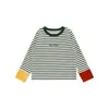 Camiseta Base de Manga Larga con Cuello Redondo y Bloques de Color Rayados para Niños Wulibuyi 2026 Nuevo Estilo Coreano Primavera y Otoño Camiseta Infantil Moderna
