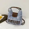 Mochila para Mujer 2025 Nuevo Otoño Popular Bolso Tote para Viajar Diseño de Nicho Versátil Estilo Extranjero Mochila de Gama Alta