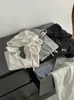 2025 Otoño Temprano Nuevo Estilo Coreano Hombro Derecho Alta Elasticidad Delgado Versátil Con Capucha Recorte de Oreja Camiseta Camiseta Base Superior 1911