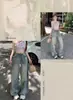 Jeans rotos de cintura alta estilo retro americano para mujeres altas, primavera/verano 2026, pantalones de pierna ancha rectos holgados que estilizan, alargados