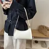 Bolso pequeño cuadrado de moda estilo coreano para mujer, nuevo modelo otoño 2026, textura de lujo ligero, bolso de hombro para ir al trabajo, bolso de axila