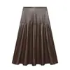 Fábrica de Ropa para Mujer Transfronteriza Venta al por Mayor 2026 Estilo Europeo y Americano Moda Efecto Piel Falda Midi Plisada