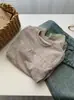 Camiseta Longa Jacquard de Textura Suave Estilo Coreano com Design Exclusivo para Mulheres, Top de Primavera com Gola Redonda e Renda Patchwork