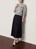 Atacado Transfronteiriço Roupas Femininas Item Quente 2026 Outono Novo Design Estiloso Estilo Casual Versátil Cor Sólida Saia
