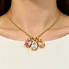 Collar de titanio y acero con circonita de alta gama europeo y americano, joyería de diseño único de nicho, cadena de clavícula de gota de acero inoxidable chapado en oro