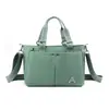 Bolsa de tela de nailon impermeable ligera mochila cruzada versátil nueva bolsa de mano portátil gran capacidad Bolso de hombro para mujer