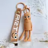 Colgante de Figura de Palo de Madera Transfronterizo, Versión Extranjera Viral del Llavero Shanhaijing, Figura Abstracta Peculiar, Encanto para Bolso Regalo