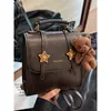 Mochila Universitaria Retro Versátil para Mujer 2026 Nueva Moda Tendencia Estudiante Viaje Diario Mochila Pequeña
