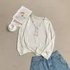 Camisa básica estilosa de manga longa com babados estilo coreano, solta e modeladora, nova blusa versátil da moda para mulheres no outono