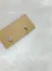 Hellopuppy Brincos de Chave Assimétricos de Amor Cheios de Diamantes Fivela de Trava de Aço Titânio Empilháveis com Furos Duplos na Orelha Doce Cool y2k Feminino
