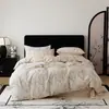 Nuevo juego de ropa de cama de cuatro piezas de gasa doble estampada, grado A, apto para bebés y madres, ropa de cama tejida estampada de doble capa para todas las estaciones