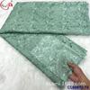 Agua floral encaje soluble en agua bordado a máquina grande taladro de presión tela hueca vestido tela de encaje al por mayor encaje francés