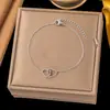 Collar de Lujo Accesible de Nicho Casual y Exquisito Collar con Colgante de Corazón Pequeño Cadena para Clavícula de Acero de Titanio Dorado de 18 Quilates que No se Desvanece para Mujeres