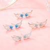 Pendientes S999 con alas azules, nuevos pendientes femeninos de temperamento nicho, pendientes de circonita de moda exquisita que combinan con todo.