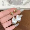 Pendientes de Bola Metálicos Cepillados de Alta Gama Otoño e Invierno 2025 para Mujer, Estilo Fresco, Diseño de Nicho, Pendientes Personalizados, Tendencia en Pendientes