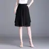 Pantalones cortos de gasa de talla grande para mujer 100 kg, pantalones anchos de cintura alta holgados para madres de mediana edad y mayores, pantalones de falda de dos piezas falsos