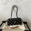 Bolso de axila de diseño de nicho transfronterizo con lunares estilo coreano fresco y versátil dulce bolso de un solo hombro bolso de mano de alta gama de moda