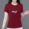 Camiseta moderna de manga corta para mujer, fina de verano, corte holgado, top casual estampado adelgazante, adecuada para madres, versátil y elegante