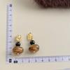 Pendientes vintage marrones estilo Maillard, pendientes de viñeta irregular con temperamento estilo Hong Kong, pendientes de moda francesa de gran sentido.