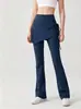 Pantalones de fitness de cintura alta cortina de glúteos pantalón falda de dos piezas falsas que cubren la cadera pantalón tiburón pantalones deportivos casuales de primavera y otoño pantalones acampanados de yoga para mujer