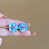 Graffiti de Verano~Coloridos Pendientes de Flor para Mujeres Sin Perforaciones 2026 Nuevo Estilo Caliente Y2K Pendientes Dulces y Elegantes