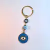 Colgante de Serie Ojo de Diablo Transfronterizo Europeo y Americano Colgante de Llavero de Joyería de Animales Ojo de Hueso con Goteo de Aceite Accesorios de Aleación para Mujeres