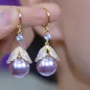 Elegantes pendientes de hoja de perla morada con diamantes completos, diseño de nicho, pendientes de alta gama para mujer, pendientes de moda de lujo ligero