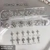 Accesorios de arte para uñas de cruz oscura de 12 piezas, artículo popular de exportación transfronteriza, remaches de aleación y pedrería, accesorios de uñas portátiles para DIY