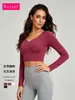 Novo top de yoga com costas cruzadas, mangas compridas e bojo embutido, feito de elastano de alta elasticidade, adequado para Pilates e fitness para mulheres