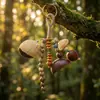 Colgante de Semilla de Fruta de Planta Natural Hecho a Mano Colgante Cascabel Viento de Nicho Terapia Musical Colgante de Campana Bolsa