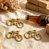 Abrebotellas de bicicleta dorada para fiesta, artículo de regalo más vendido transfronterizo, regalo promocional para eventos