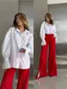 2026 Amazon Transfronteiriço Europeu e Americano Roupas Femininas Solta Botão Lapela Manga Longa Casual Cor Sólida Camisa Novo Estilo