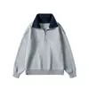 Suéter de solapa estilo americano para hombre, otoño e invierno 2026, tejido base de punto de cuello alto con media cremallera, suéter tipo chaqueta de alta gama