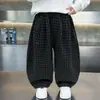 Pantalones para Niños Primavera y Otoño 2026 Nuevos Estilo Coreano Moda Cuadros Pierna Ancha Pantalones Casuales Versátiles Largos