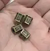 Suministro directo de fábrica aleación bronce antiguo agujero grande cuenta para tubo codo cuenta espaciadora seis palabras espaciadora DIY accesorios para equipaje al por mayor