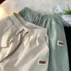 Shorts de Seda de Gelo para Mulheres Verão 2023 novo estilo coreano para estudantes calças cropped soltas versáteis calças de perna larga da moda ins para mulheres