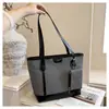 Bolsa de Ombro Grande e Elegante para o Trabalho Feminino Outono 2026 Nova Bolsa Simples de Ombro Alta Aparência Estilo Coreano Bolsa Tote