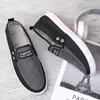 Una generación de nuevos zapatos de tela viejos de Beijing Moda Casual Zapatos de estudiante masculinos mocasines de lona vaquera de meter