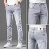Jeans ajustados elásticos de color claro para hombre, pantalones pitillo elásticos, nuevo modelo 2026, pantalones casuales de alta gama para primavera, otoño e invierno