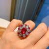 Agite o som do anel feminino mais vendido no exterior, micro diamante denier em forma de anel de zircônia corindo vermelho, simulação de contas coloridas no atacado