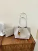 Bolsa de Ombro Grande Capacidade Estilo Retrô para Deslocamento Transfronteiriço Nova Coleção Outono/Inverno 2026 Bolsa Tote Casual Simples de Mão Bolsa Mãe e Filho