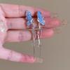 Clip para oreja de borla Super Hada Estrella para Mujer Aretes largos elegantes de lujo ligero ins nuevos nicho de celebridad de internet nuevos aretes combinan con todo