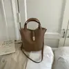 Bolso Pequeño de Cuero Suave con Patrón de Lichi para Mujer 2026 Nuevo Estilo Bolso Cesta de Mano Bolso Cubo Bolso Cruzado Retro de Primavera