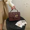 Bolsa de Ombro Transversal Quadrada Pequena Feminina Patchwork Cor Sólida Minimalista 2026 para Uso Diário com Detalhe de Cinto