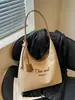 Bolsa de lona estilo coreano, casual y de gran capacidad, artística y de nicho, bolsa de hombro con sensación de alta gama, bolso de mano para mujer moderno y simple