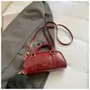 2026 Nuevo Modelo Bolso de Hombro Texturizado de Color Sólido de Moda Elegante para Mujer Bolso Boston de Moda Bolso Cruzado de Moda