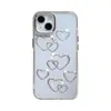 Funda Blanda Estilo Coreano con Forma de Corazón y Agujero Grande Adecuada para iPhone 17 Pro Max, Botones Metálicos Apple 16, Diseño de Nicho para iPhone 15