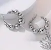 Pendientes de Bolas Redondas con Gradiente Xiyin de Venta Caliente Transfronterizos Europeos y Americanos Pendientes Exagerados Elegantes y de Moda