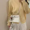 Bolso Sencillo Estilo Coreano Bolso Kelly para Mujer 2026 Modelo Nuevo Bolso Cruzado de Alta Gama para el Trabajo Bolso de Hombro Elegante Bolso Cuadrado Pequeño